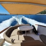 Private speedboat with shaded seating area